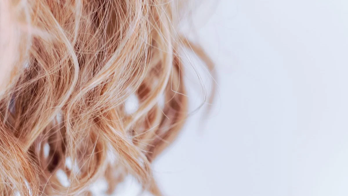 Close-up of long, smooth blonde hair